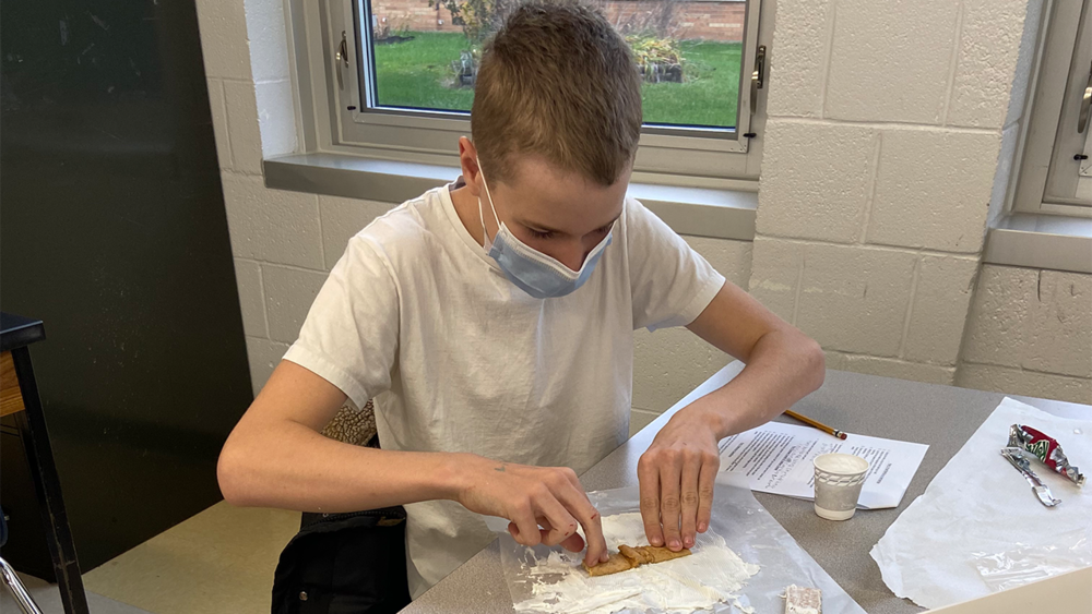 Student Participating in Edible Tectonic Plate Lab